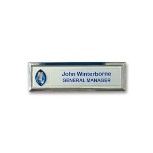 B2 Hotel name badge with an applied 3D emblem. Reusable