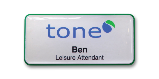 H45 robust green frame namebadge dome printed by Fattorini 75 x 35mm